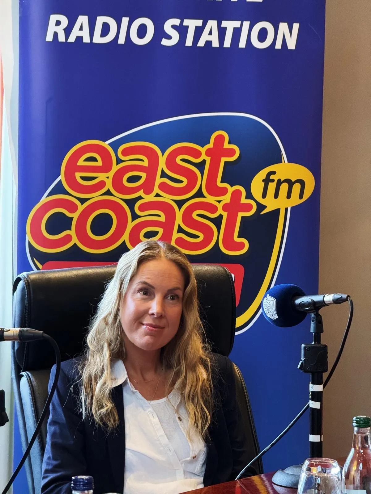 Georgie Durcan in the East Coast FM radio studio