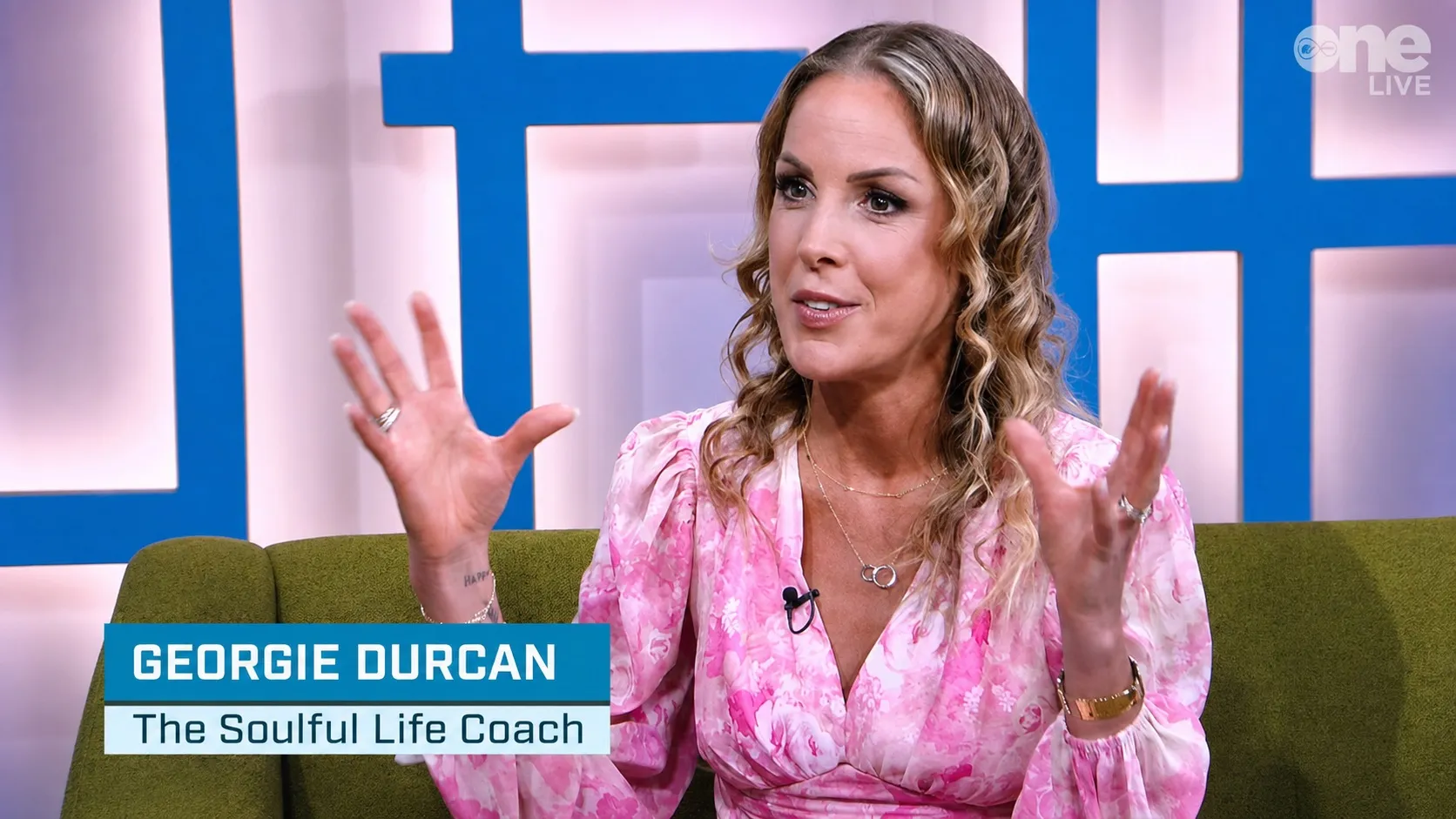 Georgie Durcan being interviewed on a television sofa