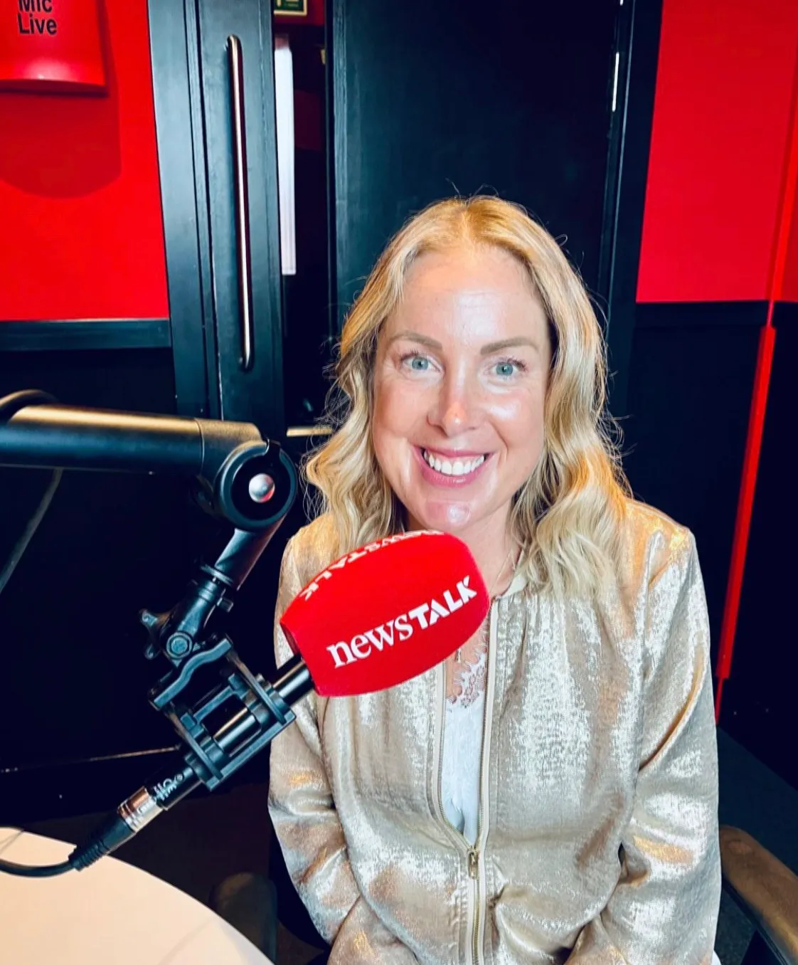Georgie Durcan recording in a podcast studio