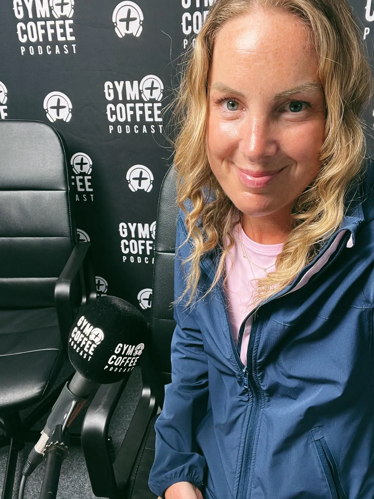 Georgie Durcan behind a microphone in a radio studio